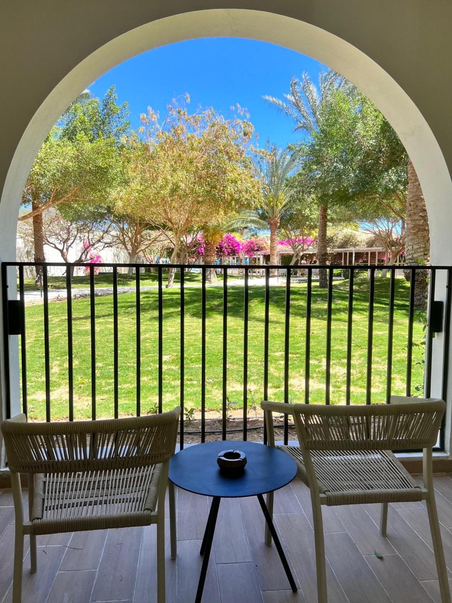 Desert Rose Resort Hurghada Exterior foto View of the garden from the hotel